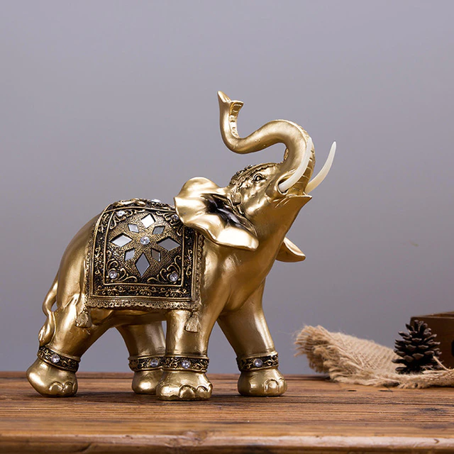 Golden Elephant Figurine Statue Elegant Trunk Sculpture