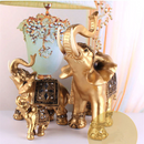 Golden Elephant Figurine Statue Elegant Trunk Sculpture